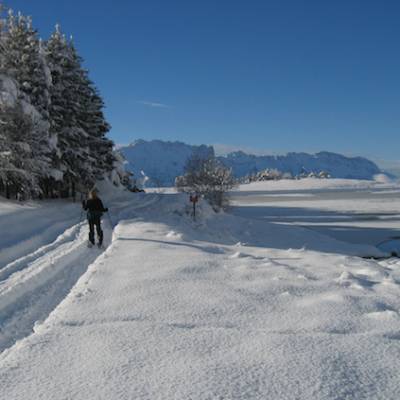 Snowshoeing around a lake