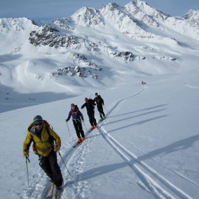 Ski touring skin up to Refuge de la Blanche in winter