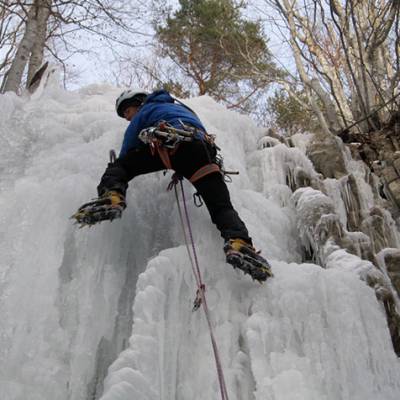 ice climbing on ice falls in the Alps