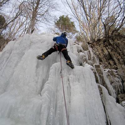 Ice Climbing climbing up an ice fall