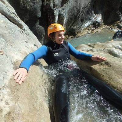 Canyoning-with-Undiscovered-Mountains-in-the-southern-french-alps-backwards-slide.jpg