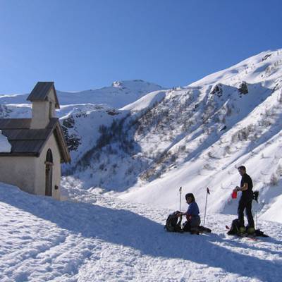 Ski Touring stop at a little chapel