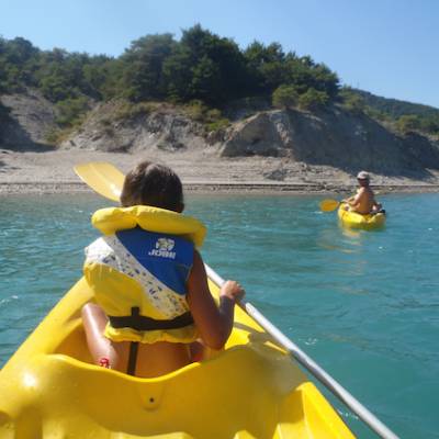Lake Kayaking on the Lac du Serre Poncon blue wate