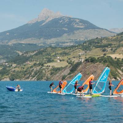 Windsurfing on lac du Serre Poncon in the Alps