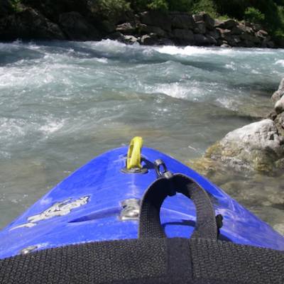 Kayaking in the Southern french Alps launching into the river